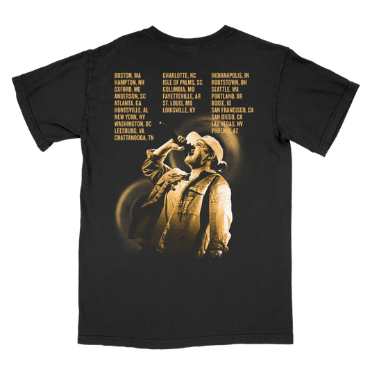 Black t-shirt with a graphic of a person on a bicycle and text on the back, displayed on a white background.